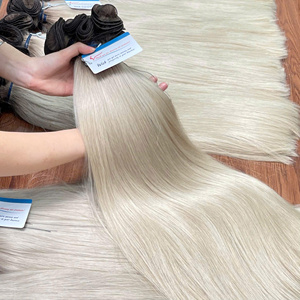 Venta al por mayor de aspecto natural fino virgen atado a mano extensiones de pelo de trama atado a mano vietnamita pelo atado a mano - Product Image 4