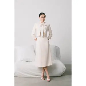 กระโปรงออกแบบหรูหราสําหรับผู้หญิงเสื้อผ้าฤดูร้อน LISA กระโปรงยาวกลาง ผ้าคุณภาพสูง โลโก้ที่กําหนดเอง ผู้ผลิตเวียดนาม