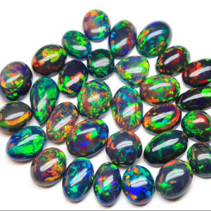 Merveilleux cabochon d'opale noire éthiopienne forme ovale brillant arc-en-ciel flashy pierre précieuse d'opale noire éthiopienne au prix de gros - Product Image 1