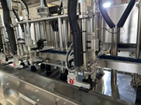 Machine de remplissage de suivi automatique de sauce au miel de viscosité machine de ligne de remplissage de servo liquide cosmétique de type 4 tête 6 tête 8 tête