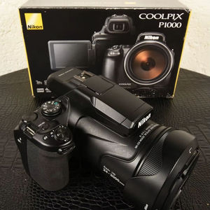Cámara Digital Compacta COOLPIX P1000 4K UHD 16MP 100% ORIGINAL, MEJOR PRECIO DE VENTA, con 3 años de garantía - Product Image 1