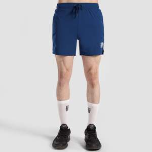 กางเกงขาสั้นออกกำลังกาย GA Sporty Gym สีเขียวอมฟ้า ผลิตจากโพลีเอสเตอร์ 100% พร้อมเอวยางยืด ทรงเบอร์มิวดา และตกแต่งด้วยโลโก้ - Product Image 1