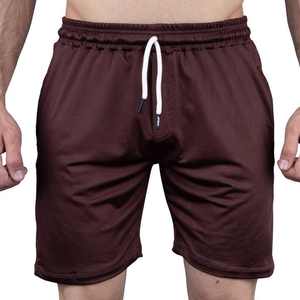 Pantalones cortos atléticos para hombre con cintura elástica Pantalones cortos de estilo casual de patrón sólido transpirable con bolsillos - Product Image 1