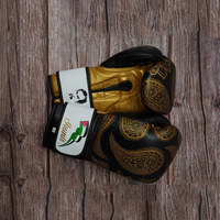 Guantes de título de boxeo para hombres y mujeres Guantes de kick boxing de cuero PU Proveedor al por mayor Guantes de boxeo personalizados de calidad superior