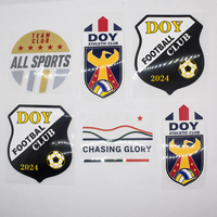 Fabricant d'étiquettes sportives, logo personnalisé de club de football, autocollants en silicone caoutchouc haute densité pour impression par transfert thermique sur les maillots