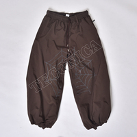 Pantalon de neige haute performance marron, imperméable et coupe-vent, avec isolation polaire et taille élastiquée pour adultes