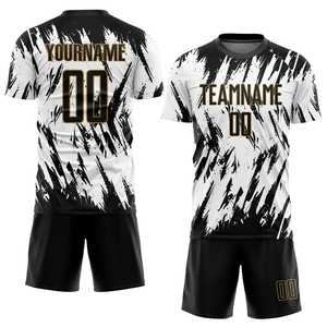 Uniforme de fútbol personalizable de alta calidad con diseño transpirable Ropa deportiva de invierno en blanco y negro Precio de servicio OEM - Product Image 1