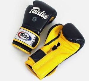 นวมชกมวยแท้ Fairtex รุ่นใหม่ BGV9 Pro Training สไตล์เม็กซิกัน เสริมแผ่นรองอย่างดี สีน้ำเงินเข้ม-เหลือง - Product Image 2