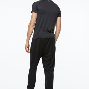 กางเกงวิ่งออกกำลังกายสำหรับผู้ชายผ้ายืดมีซิปฉลากส่วนตัว - Product Image 5