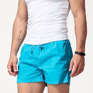 กางเกงขาสั้นแห้งเร็วเป็นมิตรกับสิ่งแวดล้อมสำหรับผู้ชายเอวยางยืดแบบลำลองระบายอากาศได้ดีสีพื้นแบบกำหนดเอง100% - Product Image 6