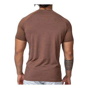 Camiseta de gimnasio de 100% algodón con logotipo personalizado para hombre, ajustada y ropa de entrenamiento de secado rápido, camisetas de técnica de soplo para entrenamiento de gimnasio activo - Product Image 2
