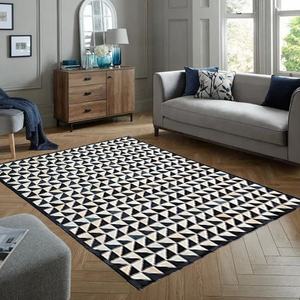 Tapis artisanal en patchwork de cuir de vache noir et blanc, tapis de luxe en cuir à poils pour la maison et le bureau - Product Image 2