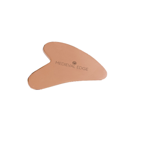 Outil de massage facial Gua Sha en cuivre de luxe Medieval Edge pour réduire les poches et les cernes, améliorer la circulation sanguine et favoriser le bien-être. - Product Image 1