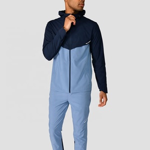 Conjunto Deportivo para Hombre, Chaqueta Ligera con Capucha Cortavientos y Pantalones Jogger, Secado Rápido, Ropa Deportiva Activa para Otoño, Talla 6XL - Product Image 1