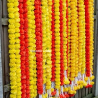 Guirlande de fleurs artificielles de souci faites à la main avec des glands pour la décoration de mariage, la porte d'entrée et les guirlandes murales