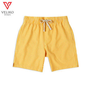 กางเกงขาสั้นผ้าใบสำหรับผู้ชายเอวกลางผ้าสแปนเด็กซ์ผสมกันยับเป็นมิตรกับสิ่งแวดล้อมชายหาดโต้คลื่นน้ำหนักเบาสไตล์ทนทาน - Product Image 1