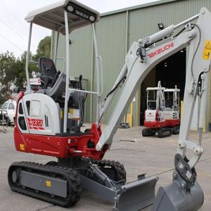 ENVÍO GRATUITO: Miniexcavadora TAKEUCHI TB216 de 16 HP, con ROPS abierto, diésel, cucharón con sistema de sujeción por pasadores, aprobada por EPA y CE, sistema hidráulico auxiliar de 2 velocidades, PLC. - Product Image 1