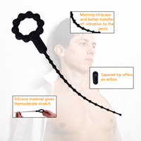 Vibromasseur urétral en silicone souple noir, type bâtonnet œil de cheval, pour stimulation électrique du gland et de l'urètre, pour masturbation masculine