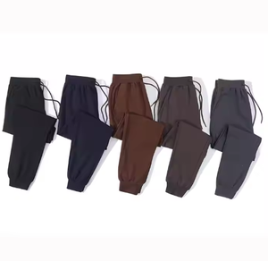 Pantalones de chándal de otoño para hombre, casuales, rectos, lisos, holgados, de cintura media, con cordón, de forro polar grueso, cortavientos, de secado rápido y antipilling. - Product Image 2
