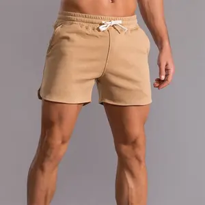 Vente en gros de shorts de gym 100% coton avec logo personnalisé ODM personnalisés pour hommes shorts de gym décontractés à motif uni teints - Product Image 4