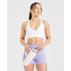 Sujetador deportivo de fibra blanca con logotipo personalizado, correas traseras ajustables, escote en forma de V, Sujetador deportivo suave de alto impacto para mujer - Product Image 4