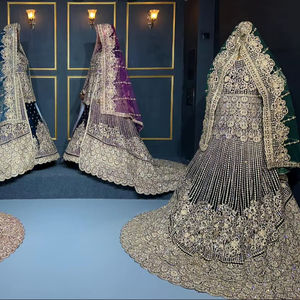 Lehenga en velours de créateur de qualité supérieure avec un travail en pierre riche taillée Heavy Trail et quatre options de couleur pour les mariages traditionnels - Product Image 1