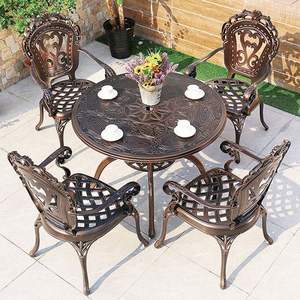 <b>Heavy</b> duty cast iron four seater table and <b>chair</b> set ideal <b>for</b> outdoor use in lawns gardens patios or veranda spaces - Product Image 4