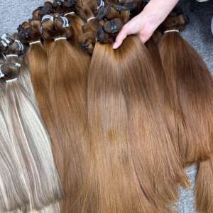 Mejor precio de fábrica 100% Extensiones de cabello humano crudo vietnamita Color recto natural Todos los tamaños Genius Weft Hair Bundles Vendedores - Product Image 1