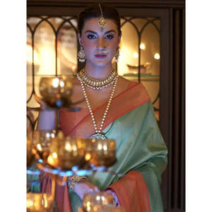 ผ้าไหมคันจิวารัมสีฟ้าสดใส ทอลายด้วยดิ้นทอง สำหรับงานเทศกาลและงานแต่งงาน - Product Image 1