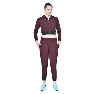 Chándales de mujer Hombro caído Nuevo estilo Trajes de bolsillo delantero Poliéster Venta caliente Mujeres lisas Mejor calidad Chándal Conjunto de 2 piezas - Product Image 1