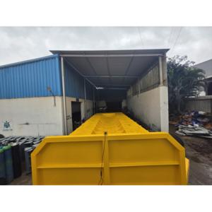 Remolque portador de bobina duradero con superficie antideslizante y mecanismos de bloqueo para un manejo y envío seguros de la bobina a precio de exportación - Product Image 1