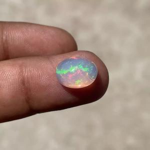 Cabujón de corte ovalado de ópalo etíope sintético tratado térmicamente ópalo arcoíris de fuego múltiple para fabricación de joyas blanco suelto para colgante de anillo - Product Image 2