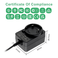 Transformador de Corriente Universal de Montaje en Pared 12V 2A con Enchufes Intercambiables Tipo A/G/F/I para Aplicaciones Mundiales
