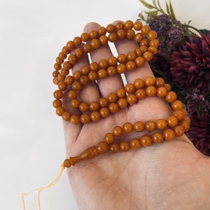 Misbaha classique vintage en ambre de la Baltique, 99 perles, chapelet islamique orange vintage - Product Image 1