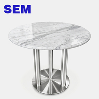 Pied de table rond robuste et durable en acier inoxydable pour restaurant commercial, idéal pour tables à manger et tables basses multi-personnes.