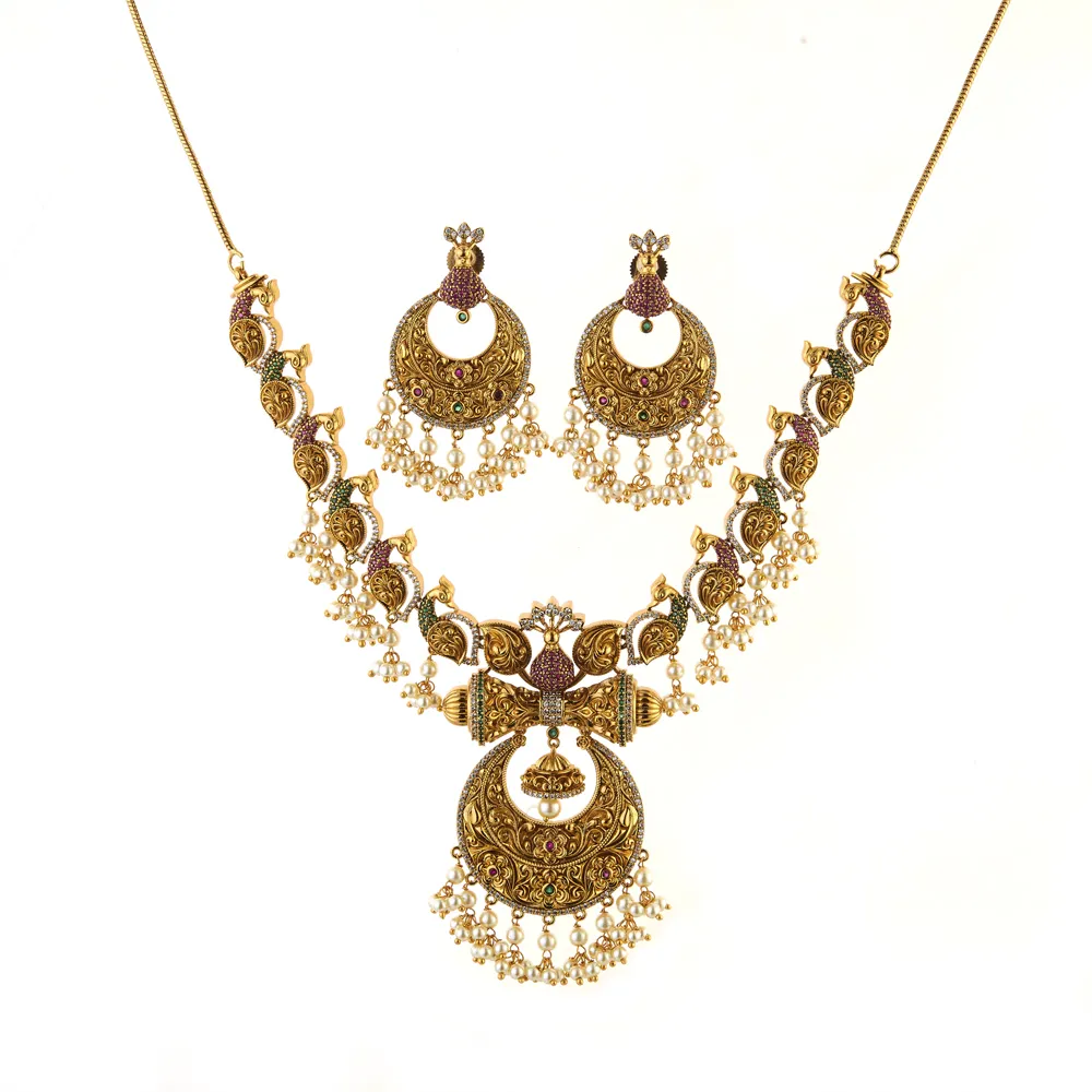 Conjunto de collar de pavo real chapado en oro antiguo hecho a mano 214335 mayoristas de joyería de Bollywood en India