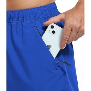 Vente en gros d'usine de haute qualité entraînement course à pied unisexe vêtements de sport décontractés shorts avec poches pour hommes shorts - Product Image 4