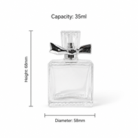 Flacon pulvérisateur de parfum en verre transparent de 25 ml, 35 ml, 50 ml, forme galet, avec bouchon à vis, pompe en aluminium et nœud papillon ABS