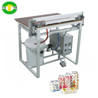 Machine de thermoscellage manuelle pour emballages de cartons de papier facial et de papier toilette