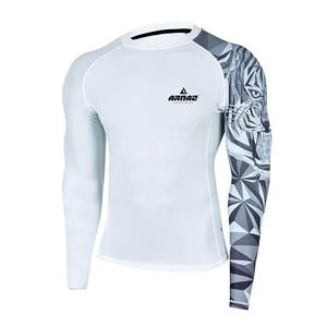 Equipo de entrenamiento de lucha de buena calidad personalizado para hombres Rash Guard MMA Rash Guard en precio razonable - Product Image 1