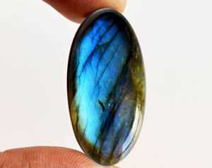 Magnífica piedra preciosa de labradorita azul, con reverso plano, pulida, de forma ovalada, con destellos azules, cabujón de labradorita para la elaboración de joyas. - Product Image 3