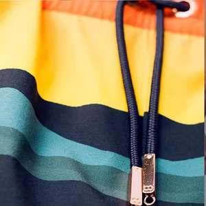 กางเกงขาสั้นรัดเอวยางยืดผ้าฝ้าย100% ผ้าโพลีเอสเตอร์ระบายอากาศได้ดีสไตล์ลำลองสีพื้น - Product Image 3