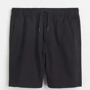 Short Cargo kaki en coton sergé avec poches et fermeture éclair pour homme