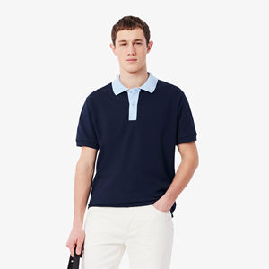 Polo informal de poliéster de alta calidad para hombre, nueva tendencia de moda con patrón, tejido de punto sólido de manga corta - Product Image 1