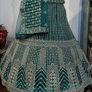 Trending Girlish Net Lehenga avec miroir lourd et Jarkan Work Hot Delhi Style en 10 couleurs assorties pour le vrac - Product Image 1