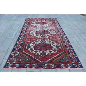 Tapis vintage, grand tapis turc 5,7x10,6 pieds, tapis en laine rouge et bleu à pois - Product Image 1