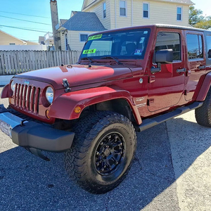 CLEAN 2014 J-e-p Wrangler Unlimited Sahara 4WD Volante a la izquierda - Product Image 1