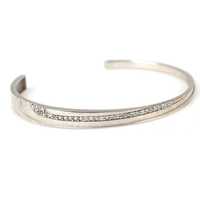 Bracelet jonc tendance en argent sterling 925 avec double rangée de pierres blanches taille brillant et sertissage en canal