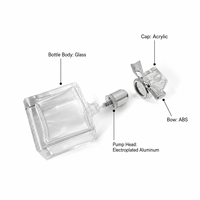 Flacon pulvérisateur de parfum en verre transparent de 25 ml, 35 ml, 50 ml, forme galet, avec bouchon à vis, pompe en aluminium et nœud papillon ABS