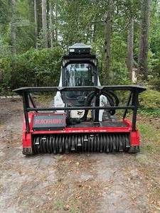 Bobcatts T770 Compact Track Loader equipped with a forestry mulcher is a powerful land-clearing machine designed - Product Image 5